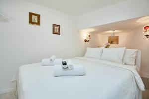 Postel nebo postele na pokoji v ubytování Apartment Villa Ahava Buža