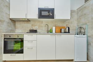 Kuchyň nebo kuchyňský kout v ubytování Apartment Villa Ahava Buža
