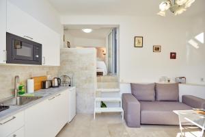 Kuchyň nebo kuchyňský kout v ubytování Apartment Villa Ahava Buža