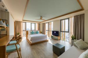 TV a/nebo společenská místnost v ubytování Fusion Suites Vung Tau