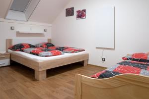 Postel nebo postele na pokoji v ubytování Relax Morava