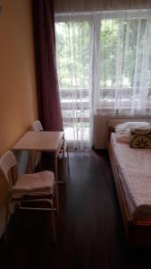 Posteľ alebo postele v izbe v ubytovaní Apartamenty i Pokoje przy Parku