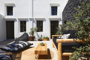 Area soggiorno di Floria Suites