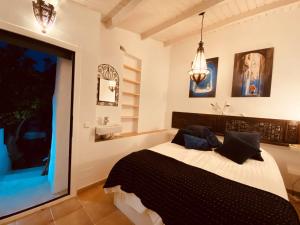 Posteľ alebo postele v izbe v ubytovaní Finca Santa Ana