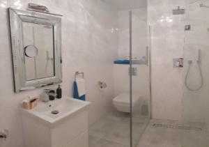 Kúpeľňa v ubytovaní Luksusowy Apartament na Promenadzie