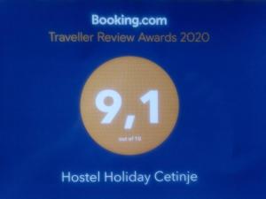 a flyer for a hospital holiday centre with a clock at Hostel Holiday Cetinje in Cetinje