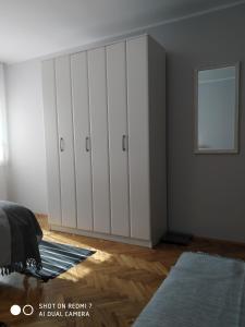 Llit o llits en una habitació de Apartman Ivan