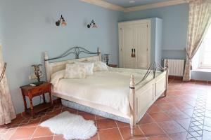 Säng eller sängar i ett rum på Villa Rural La Condesa