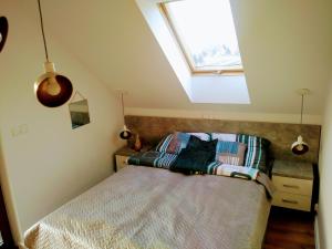 Postel nebo postele na pokoji v ubytování Na Słonecznej