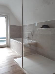 Ванна кімната в Villa De Strandjutter