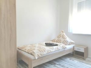 Cama ou camas em um quarto em Ferienwohnung mit Terrasse