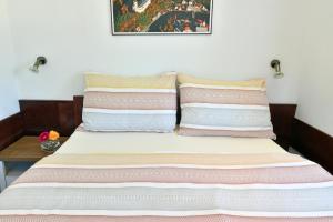 Łóżko lub łóżka w pokoju w obiekcie Pension Tenis - Centrum
