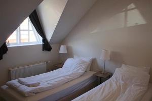 Postel nebo postele na pokoji v ubytování Mánagisting Guesthouse