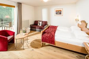 Ένα ή περισσότερα κρεβάτια σε δωμάτιο στο Bella Vista Hotel Emma