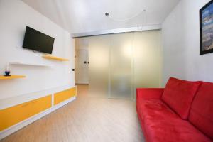 TV a/nebo společenská místnost v ubytování Residenza Alba - Molveno