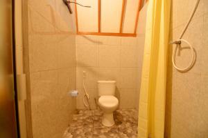 Koupelna v ubytování Bale Baleku Homestay