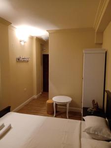 Postel nebo postele na pokoji v ubytování Adrys Boutique Villa