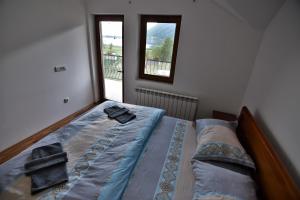 Ένα ή περισσότερα κρεβάτια σε δωμάτιο στο Guest House Blue Views +54 φωτογραφίες