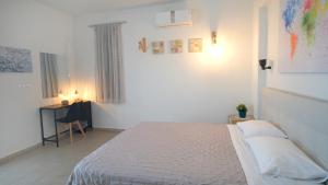 Posteľ alebo postele v izbe v ubytovaní Eva Villas West with infinity pool & and panoramic sea view