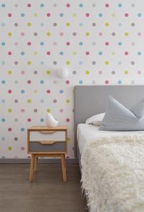 Postel nebo postele na pokoji v ubytování Hotel Madison