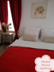 Posteľ alebo postele v izbe v ubytovaní Mickey Mouse & Studio Mini