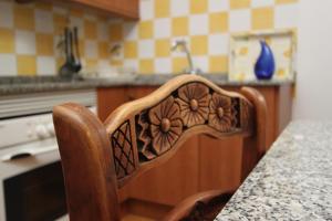 A kitchen or kitchenette at El Molinet del Governador- Apartamentos Rurales