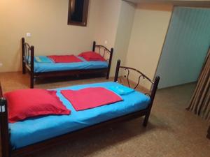 Кровать или кровати в номере FEOLA