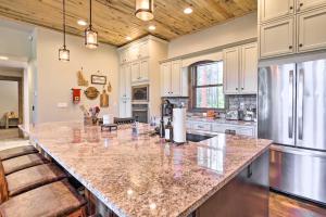 a kitchen with a large counter top in a room at Hot Tub Soaks and Spot Wildlife! Garden Valley Cabin in Crouch