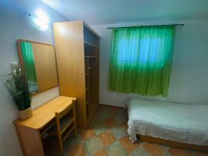 Postel nebo postele na pokoji v ubytování Apartments 'Stine'