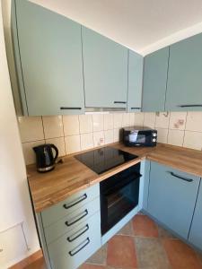 Kuchyň nebo kuchyňský kout v ubytování Apartments 'Stine'