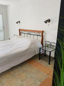 Postel nebo postele na pokoji v ubytování Apartments 'Stine'