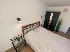 Postel nebo postele na pokoji v ubytování Apartments 'Stine'