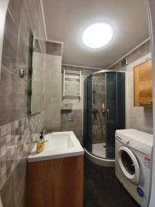 Kúpeľňa v ubytovaní Apartament 27