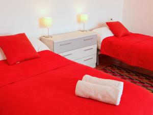 Posteľ alebo postele v izbe v ubytovaní Casa Arts guest rooms