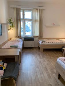 Posteľ alebo postele v izbe v ubytovaní Penzion MAR