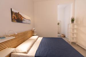 Postel nebo postele na pokoji v ubytování Venti di Brucoli