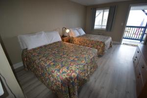 Postel nebo postele na pokoji v ubytování Island View Motel