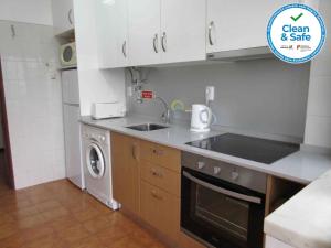 Dapur atau dapur kecil di Sol e Praia - Consolação I