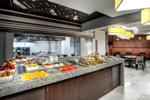 a kitchen filled with lots of counter top space at Inter Arm Hotel in Yerevan