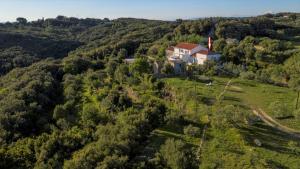 an aerial view of a house on a hill at Landhaus am Berg in Rab