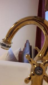 Ein Bett oder Betten in einem Zimmer der Unterkunft Hotel Feiler