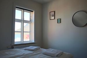 Postel nebo postele na pokoji v ubytování Mánagisting Guesthouse