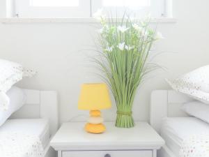 Postel nebo postele na pokoji v ubytování Apartments 'Stine'