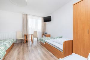 Postel nebo postele na pokoji v ubytování Paula