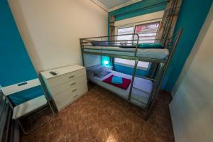 Postel nebo postele na pokoji v ubytování Casa Pueblo Alzira No Compartida