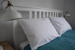 Una cama o camas en una habitación de Vila Maslina - Apartman 3