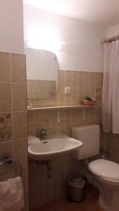 Ein Badezimmer in der Unterkunft Hotel Feiler
