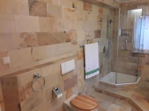 Ein Badezimmer in der Unterkunft Hotel Feiler