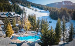 an aerial view of a resort with a ski slope at Blackcomb Springs Suites by CLIQUE in Whistler
