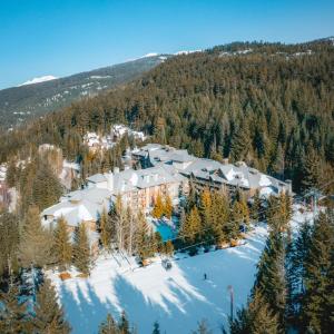 an aerial view of the resort in the snow at Blackcomb Springs Suites by CLIQUE in Whistler
